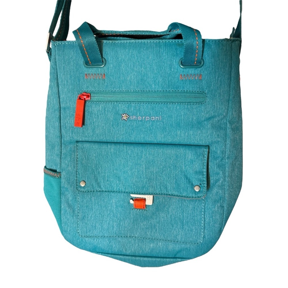 SHERPANI Crossbody Travel Bag Canvas Teal Blue Orange Accents